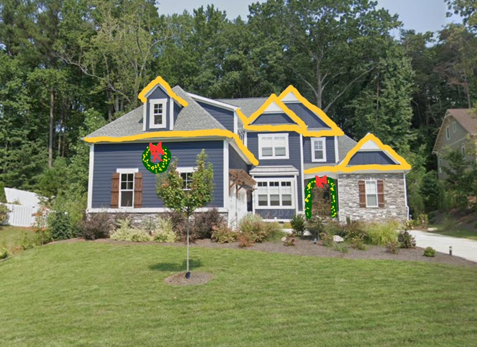 Option three: roofline lighting, entry garland, and a gable wreath