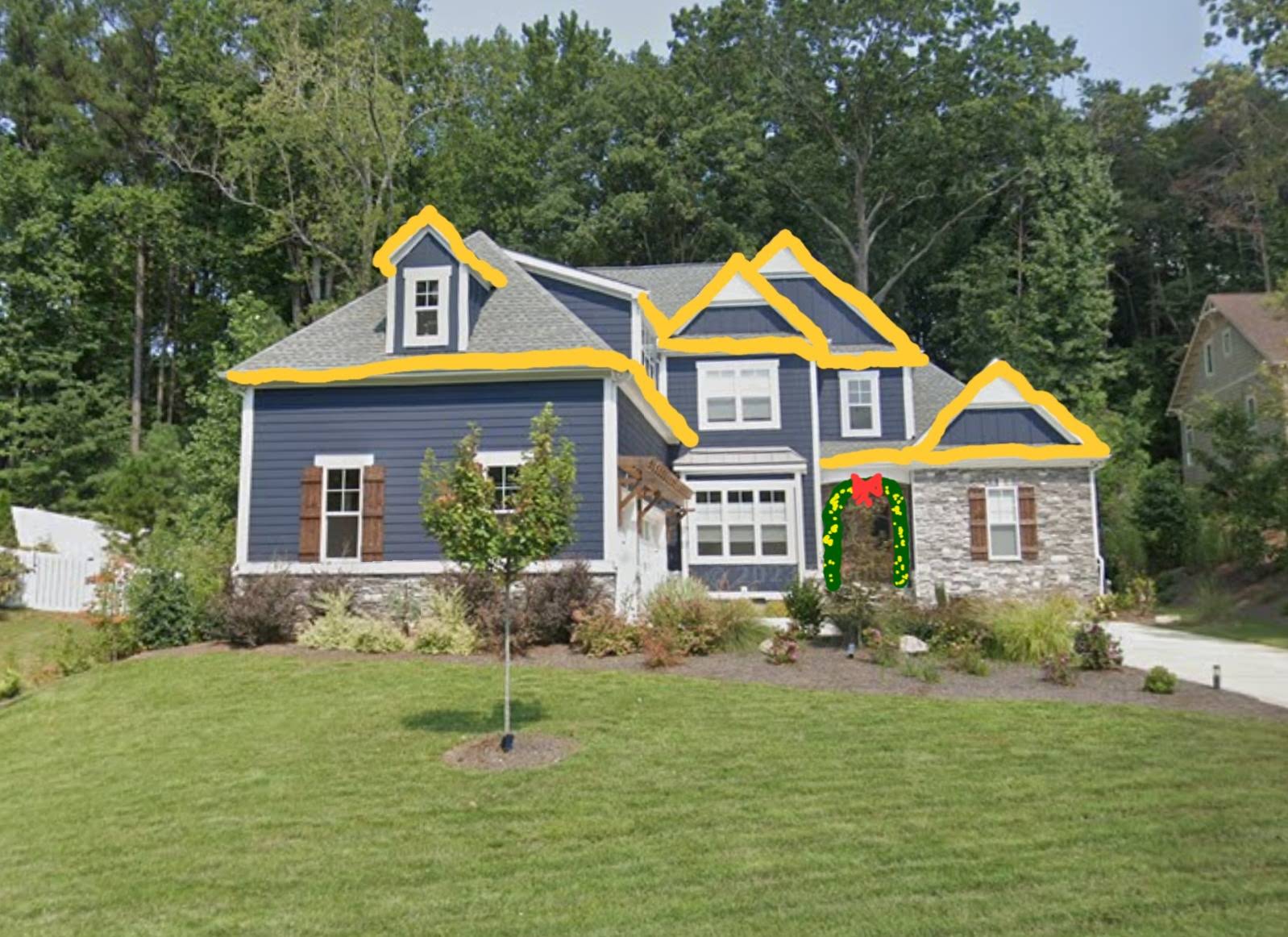 Option two: roofline lighting with garland and a bow over the entry